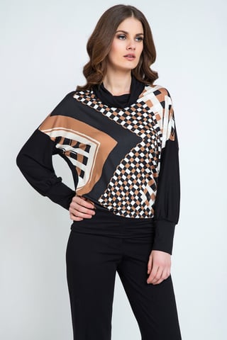 Top de manga murciélago con estampado geométrico.