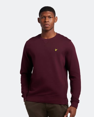 Jersey tipo jersey en color burdeos con la marca Lyle & Scott