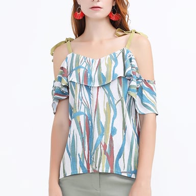 Top with tropical print and ruffles on the shoulders