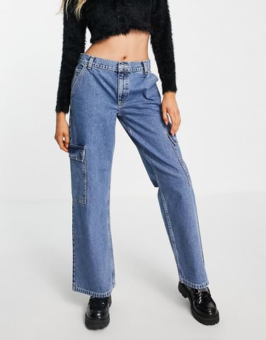 ASOS DESIGN cotton blend low rise 'cargo' jean in mid wash blue