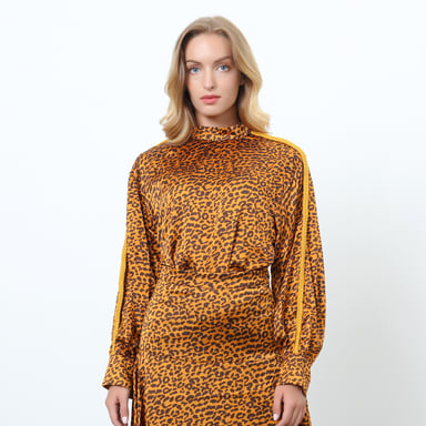 Leopard print blouse and tassel sleeves
