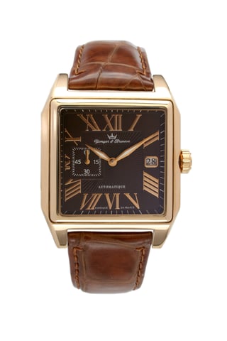 Reloj Yonger con números romanos y esfera marrón de cuero