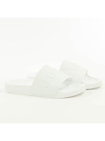 Mules Guess para hombre con logo grabado