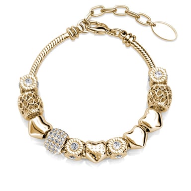 Pulseras con dijes radiantes: oro y cristal