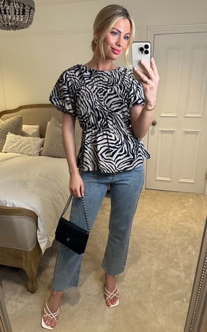 Top acampanado con estampado de remolinos