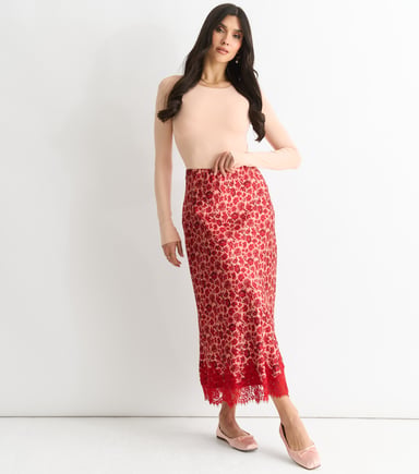 Falda midi roja de encaje floral al bies