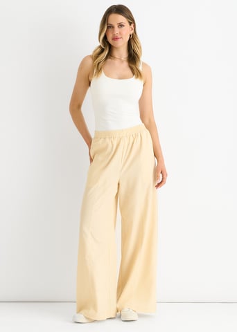 Pantalones de cintura elástica color crema