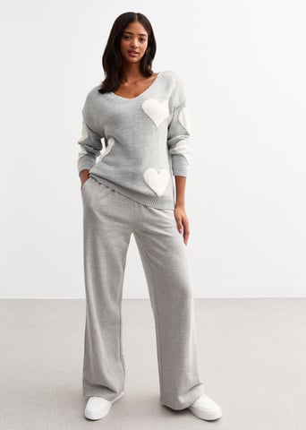Jersey de punto con corazón oversize y cuello en V gris