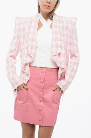 Blazer de tweed con flecos en color rosa