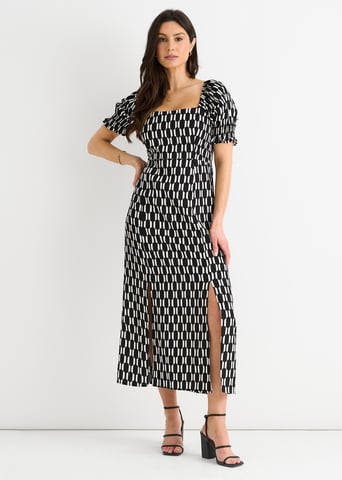 Vestido midi negro con estampado geométrico y cuello cuadrado