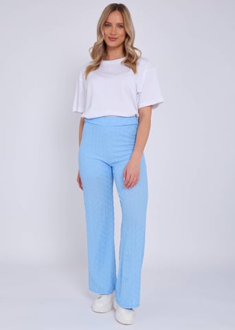 Pantalones acampanados con cintura elástica y textura azul cielo