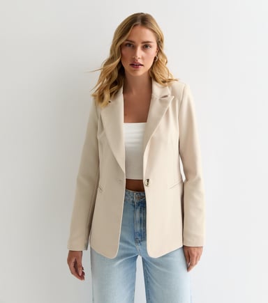 Blazer a medida beige con bolsillos