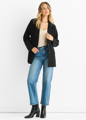 Blazer oversize drapeado negro de sastrería