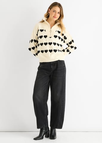 Jersey de punto suelto con cremallera y corazón en crema
