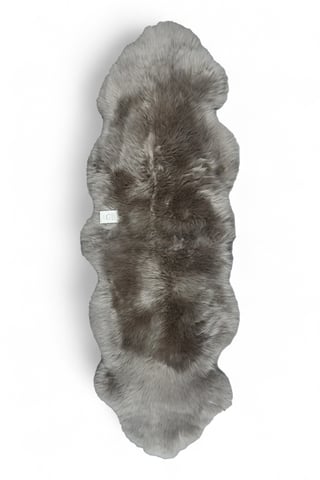 Alfombra de lana auténtica, suave, sedosa y con doble textura de piel de oveja y hongo.