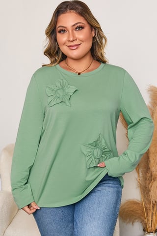 Top de manga larga con detalles de flores