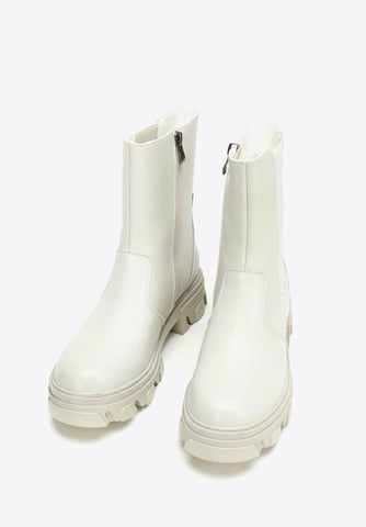 Botas Chelsea de piel Wittchen para mujer con plataforma gris y beige