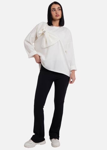 Jersey oversize con lazo lateral en contraste y color crema