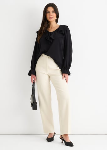Blusa holgada con volantes anchos negros