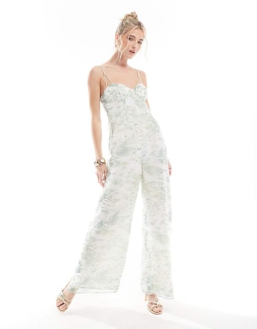 ASOS DESIGN råkantig korsettpanelad jumpsuit med utskärning i suddig djurmönster