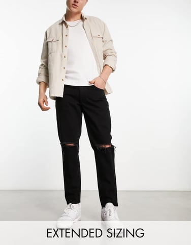 ASOS DESIGN tapered fit jeans i svart tvätt med knäsprickor - SVART