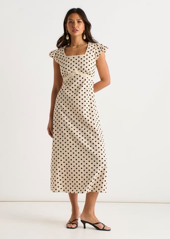 Vestido midi de algodón color crema con estampado de lunares y ribete de encaje