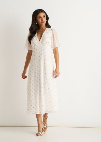 Vestido midi skater blanco con cuello en V y lámina metalizada