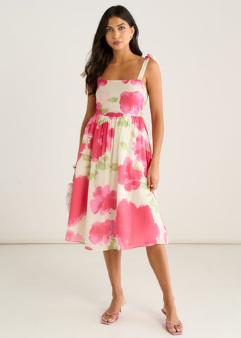 Vestido midi con tirantes y estampado floral rosa