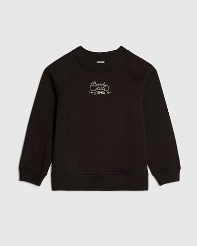 Sudadera negra para niña River Island con detalle de cremallera en la espalda