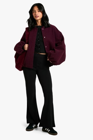 Pantalones acampanados elásticos Petite