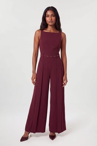 Mono de crepé de pierna ancha con pliegues estilo kilt