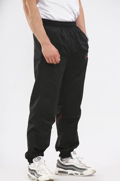 Nike Air Pantalones de chándal tejidos ligeros para hombre Negro - Image 3