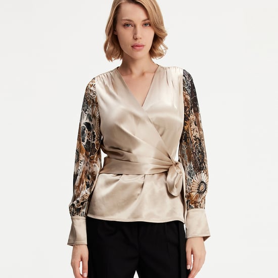 Cross heart top with floral print sleeves - Image 1