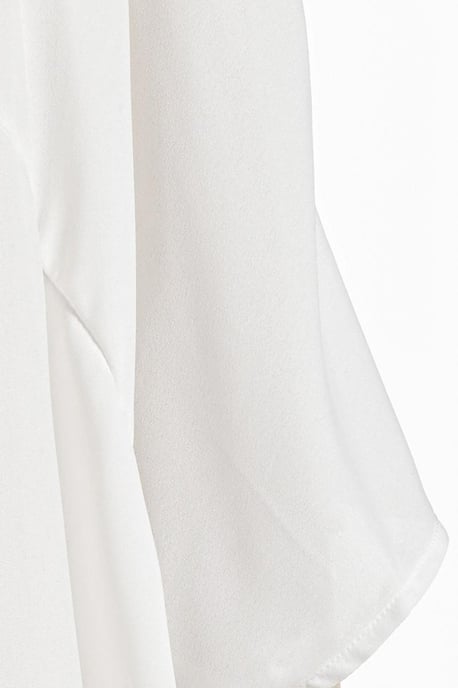Tunic with Uneven Hemline