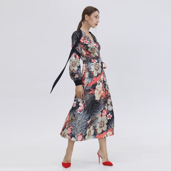 Wrap dress in macro floral print and satin bias - Image 1