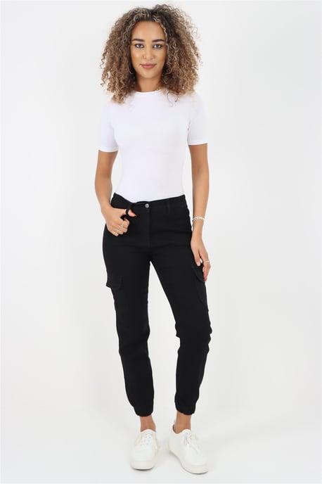 Vaqueros con puños y cintura elástica lateral para mujer en negro - Image 6