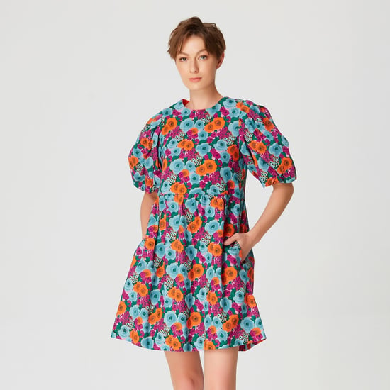 Short trapeze dress with floral print - Image 1