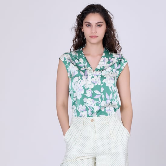 Sleeveless blouse with wide flat collar and macro flower print - Image 1