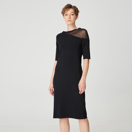 Minimalist jersey dress with asymmetrical cutting - Image 1