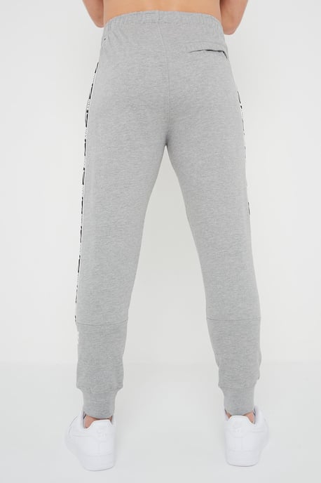 Nike Joggers de polar con puños y logo repetido en gris para hombre - Image 2