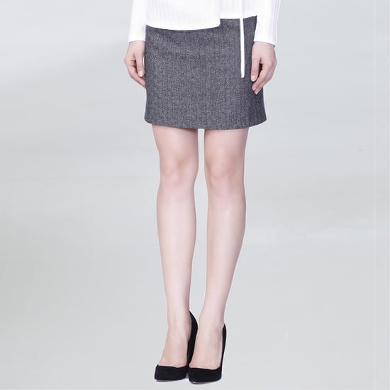 Short wool skirt and leather bias - Image 1