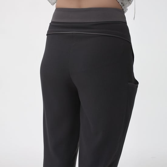 Bi-material tapered pants - Image 5