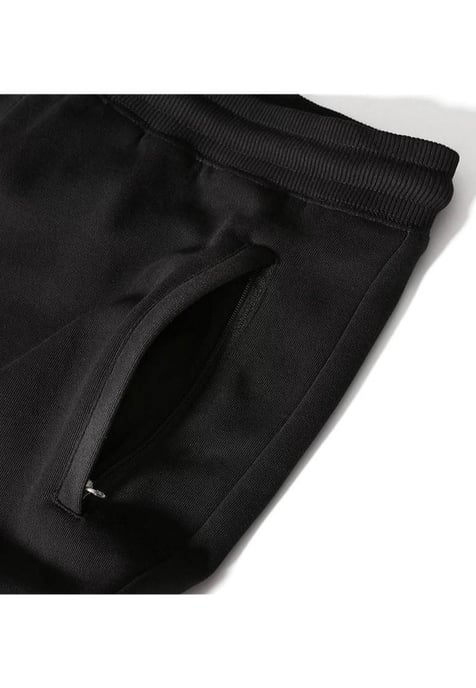 The North Face NSE Hombre Pantalón Jogger De Polar Con Puños Negro - Image 6