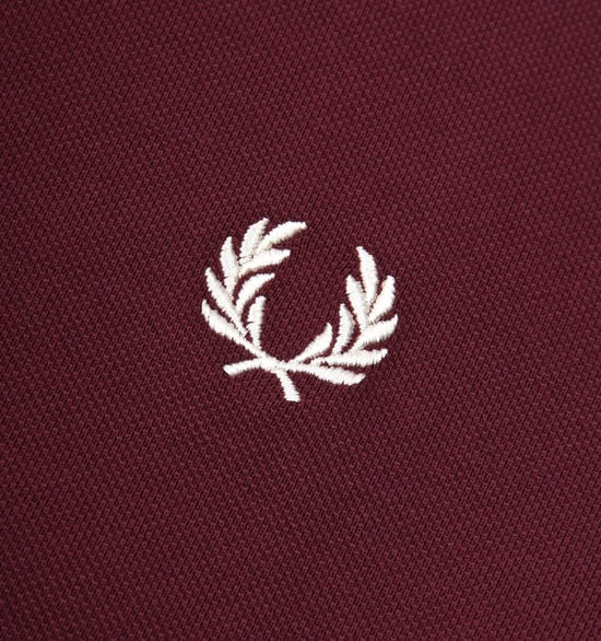 Men's Fred Perry M6000 Plain Polo Shirt in Red - Image 4