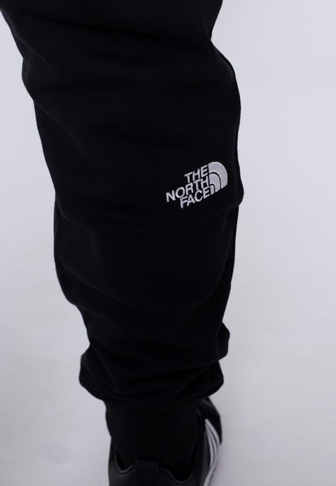 The North Face NSE Hombre Pantalón Jogger De Polar Con Puños Negro - Image 5