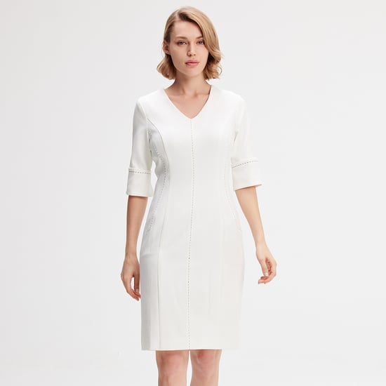 Short dress with contracted stitching - Image 1