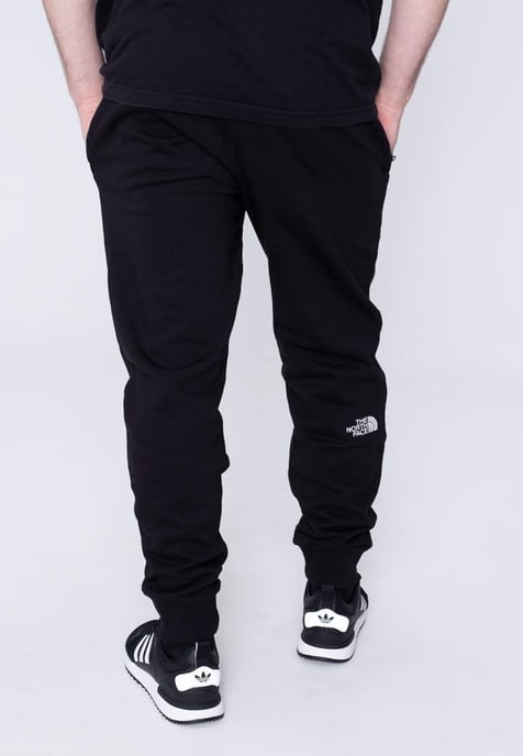 The North Face NSE Hombre Pantalón Jogger De Polar Con Puños Negro - Image 2
