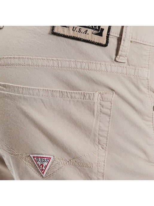 Vaqueros cortos Guess para hombre - Image 2