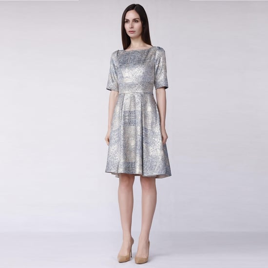 Curved and flared cocktail dress in jacquard - Image 1