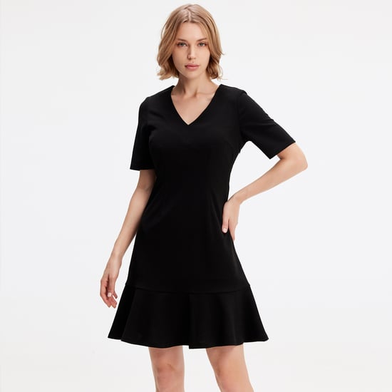 Minimalist trapeze jersey dress - Image 1